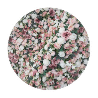 Colourful artificial flowers: vibrant background cutting board