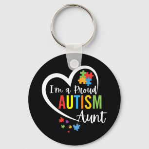 Colourful autism awareness puzzle pieces heart per key ring