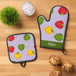 Colourful bell peppers on purple oven mitt & pot holder set