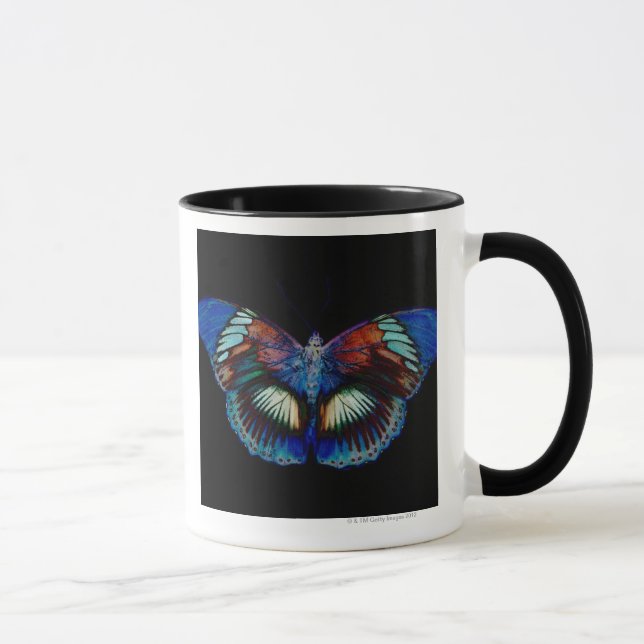 Colourful Butterfly design against black backdrop Mug (Right)