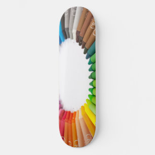 Colourful chalk crayons skateboard
