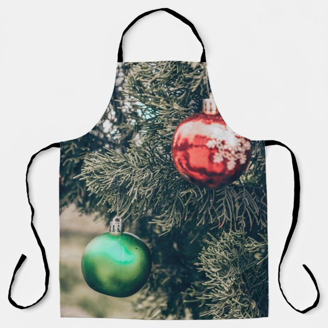 Colourful Christmas bauble decoration on a tree. V Apron (Front)