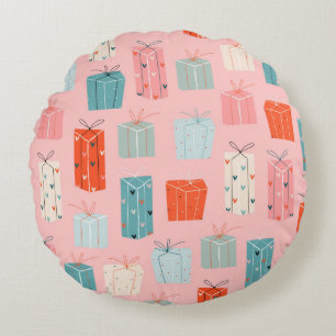 Colourful Christmas gifts on a pink background. Se Round Cushion