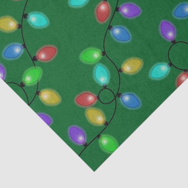 Colourful Christmas Lights On Green Tissue Paper (Detail)