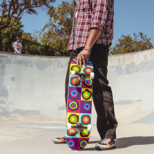 Colourful circles inside squares skateboard
