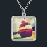 Colourful Cupcake with Cherry on Top Silver Plated Necklace<br><div class="desc">A bright summery photo of a delicious cupcake. This image has white fluffy clouds amd mountains in the background. The yummy cupcake is contained in a bright pink and purple red wrapper. The cupcake itself is a combination of vanilla cake and chocolate icing with a juicy cherry on top with...</div>