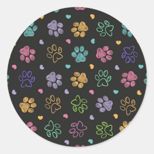 Colourful doodle paw print black background classic round sticker