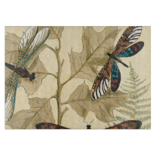 Colourful Dragonflies Floating Above Leaves Cutting Board