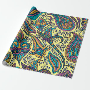 Colourful ethnic paisley pattern on yellow wrapping paper