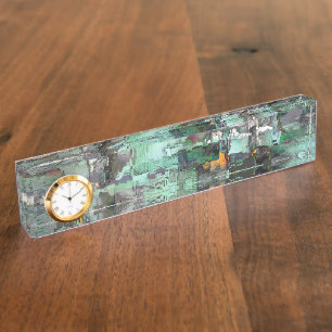 Colourful fake rock predominated mint green to gre nameplate