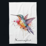 Colourful Flight, watercolor hummingbird custom Tea Towel<br><div class="desc">Brighten your kitchen with a vibrant touch of natural beauty using our Custom Kitchen Towel, featuring the captivating "Colourful Flight, Watercolor Hummingbird" design. This charming towel showcases a stunning watercolor hummingbird in dynamic flight, a kaleidoscope of iridescent blues, greens, oranges, and purples bursting from an artistic paint splatter background. It's...</div>