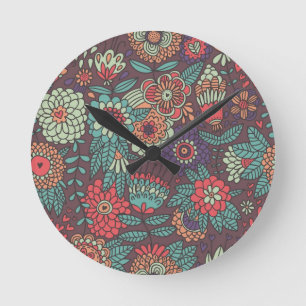 Colourful floral pattern in cartoon style round clock