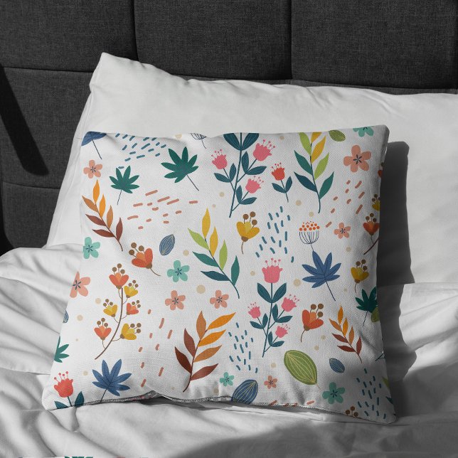 Colourful Floral Print Cushion (Colorful Floral Print Pillow on bed)