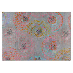 Colourful flower pattern with dotted graphic lines cutting board