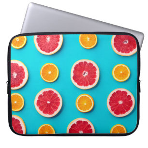 Colourful fruit pattern of fresh orange and grapef laptop sleeve