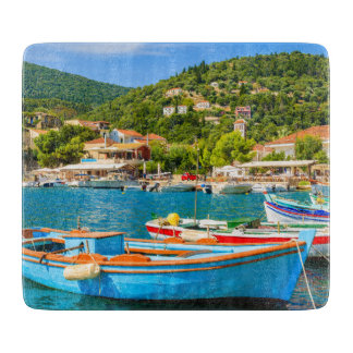 Colourful Greek fishing boats in port of Kioni Cutting Board
