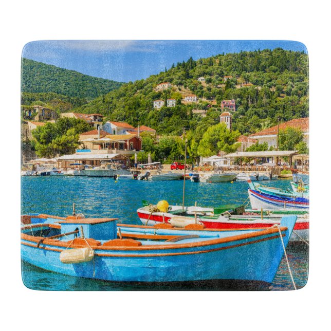 Colourful Greek fishing boats in port of Kioni Cutting Board (Front)