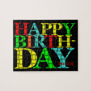 Colourful Happy Birthday Text with Black Jigsaw Puzzle