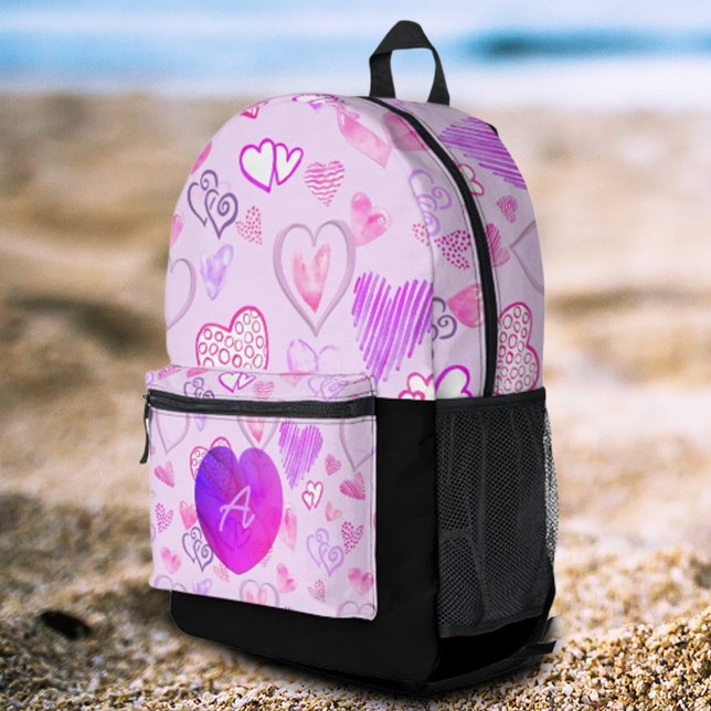 Colourful Heart Pattern Initial Letter Monogram Printed Backpack (A personalized initial letter monogrammed backpack ready for an on the go life. )