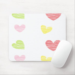 Colourful hearts on white mouse mat