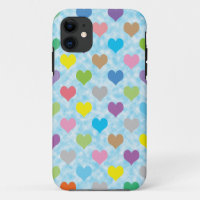 Colourful hearts pattern on blue background