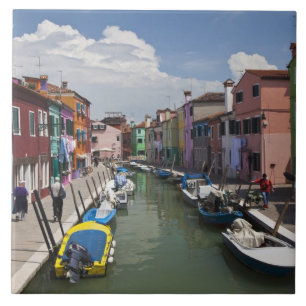 Colourful homes along canal on the island of tile