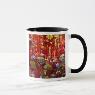 Colourful items for sale in a shop in Hong Kong Mug