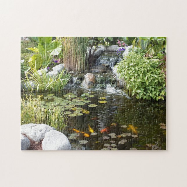 Colourful Koi in Lily pond with waterfall Jigsaw Puzzle (Horizontal)