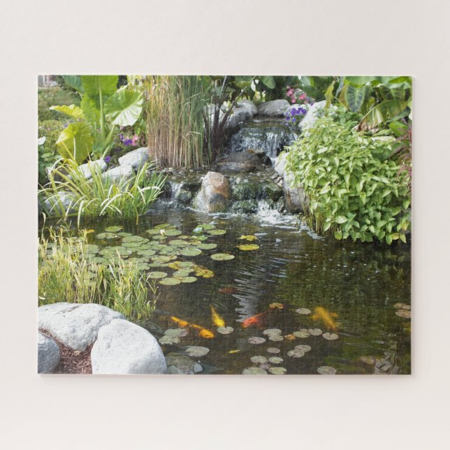 Colourful Koi in Lily pond with waterfall Jigsaw Puzzle (Horizontal)