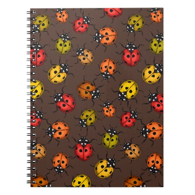 Colourful ladybugs on brown notebook (Front)