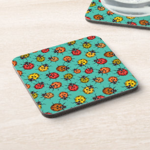 Colourful ladybugs on turquoise coaster
