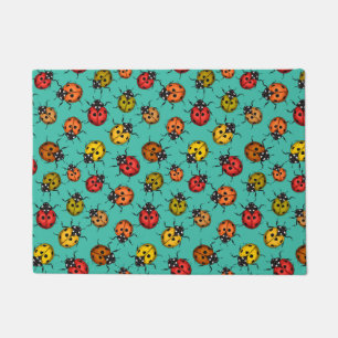 Colourful ladybugs on turquoise doormat