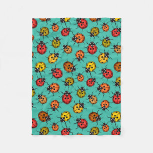 Colourful ladybugs on turquoise fleece blanket
