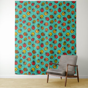 Colourful ladybugs on turquoise tapestry