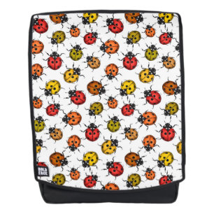 Colourful ladybugs on white backpack