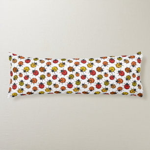 Colourful ladybugs on white body cushion