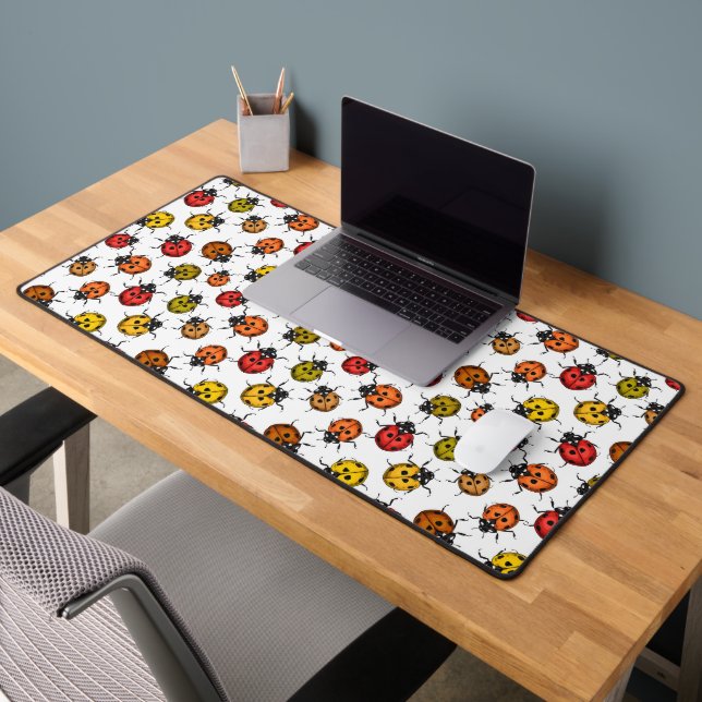 Colourful ladybugs on white desk mat (Office 2)