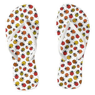 Colourful ladybugs on white flip flops