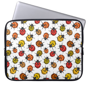 Colourful ladybugs on white laptop sleeve