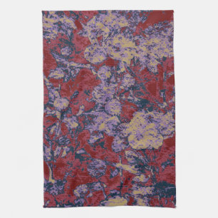 Colourful leaf and flower camouflage pattern tea towel