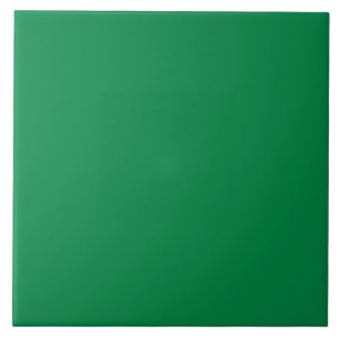Colourful leaf pattern solid green tile