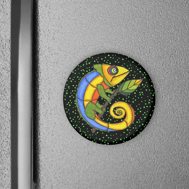 Colourful Lizard on a Branch Magnet (Colourful fantasy lizard holding twig with leaf green polka dots on black round magnet.)