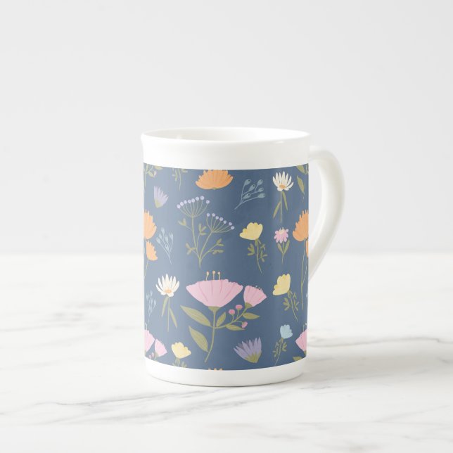 Colourful meadow on blue bone china mug (Front Right)