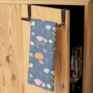 Colourful meadow on blue tea towel
