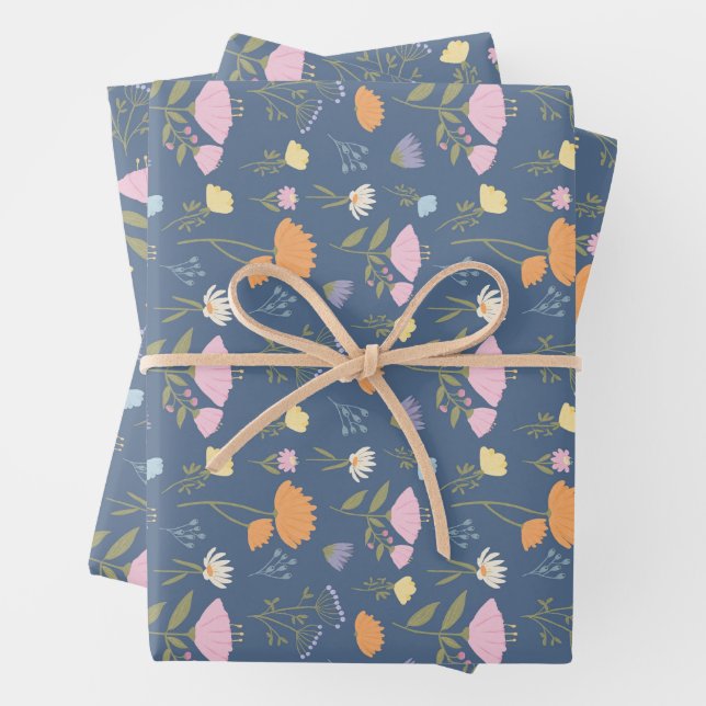 Colourful meadow on blue wrapping paper sheet (In situ)