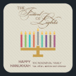 Colourful Menorah Hanukkah Square Sticker<br><div class="desc">Here's a fun graphic look for a Hanukkah sticker. A colourful menorah highlights a striped taupe coloured panel with an ornate "Festival of Lights" in a typographic treatment above. A special customised message goes underneath. Great as envelope seals or for sticking on holiday packages or gifts. Available in alternate colours...</div>