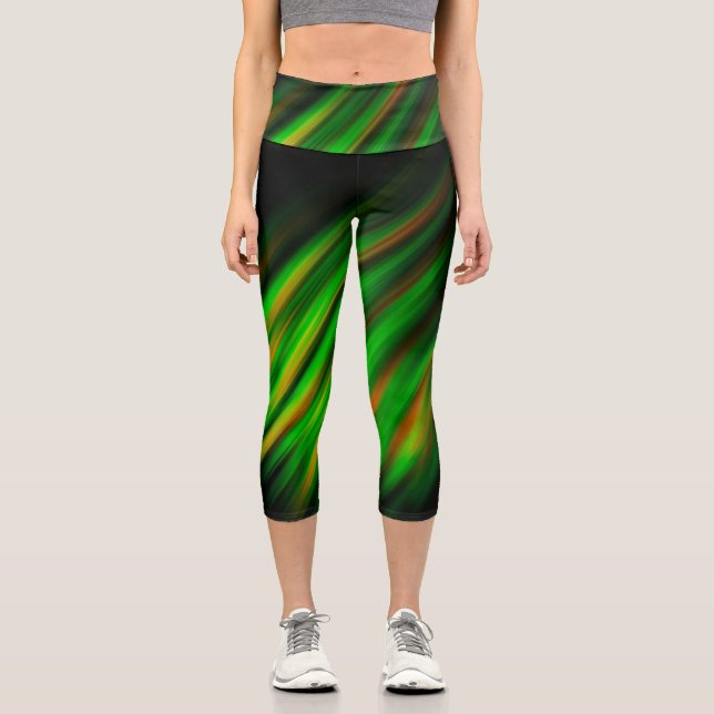 Colourful neon green brush strokes on dark grey capri leggings (Front)