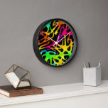 Colourful neon splatter paint design clock<br><div class="desc">Colourful neon splatter paint design,  this design features a Colourful neon splatter paint designs on black background,  watercolor.</div>