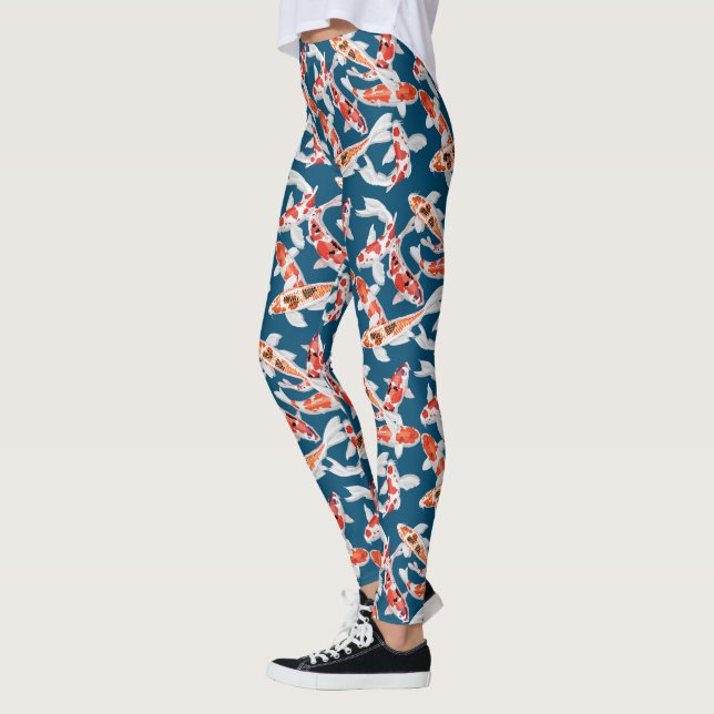 Colourful orange and black koi fish leggings (Left)