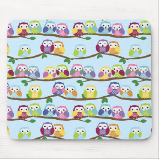 Colourful owls on a branch mouse mat